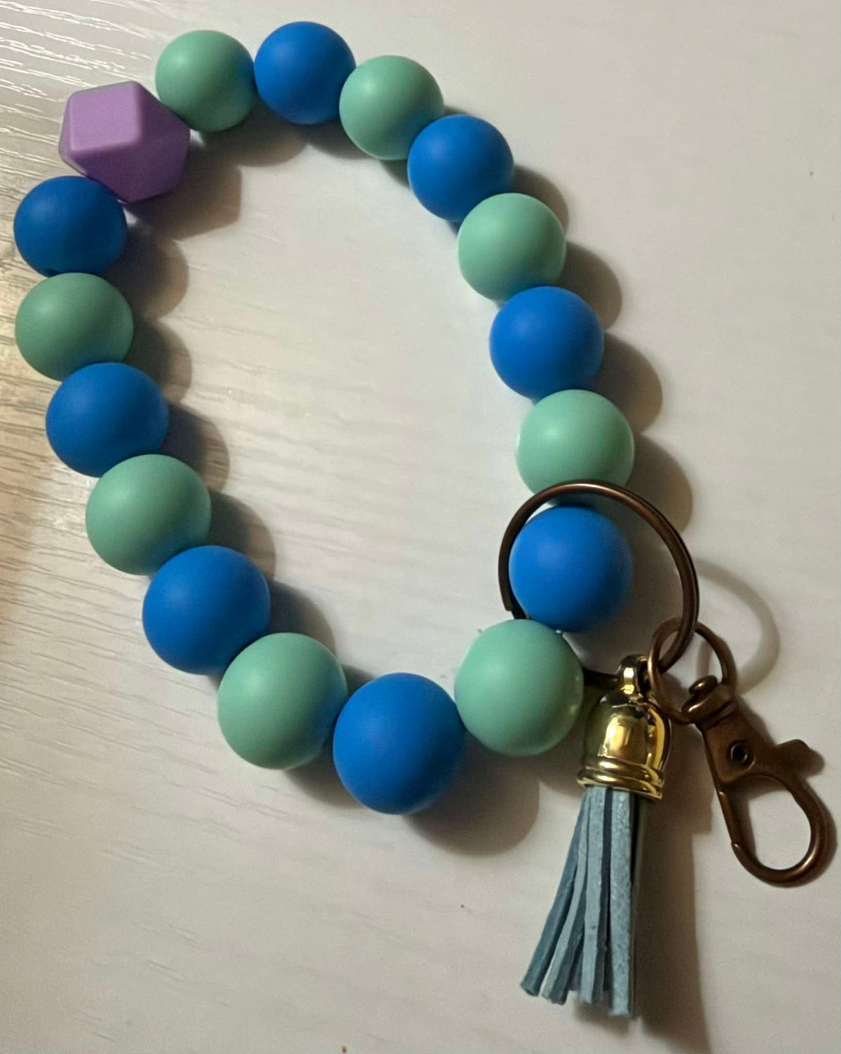 Blue and aqua wristlet