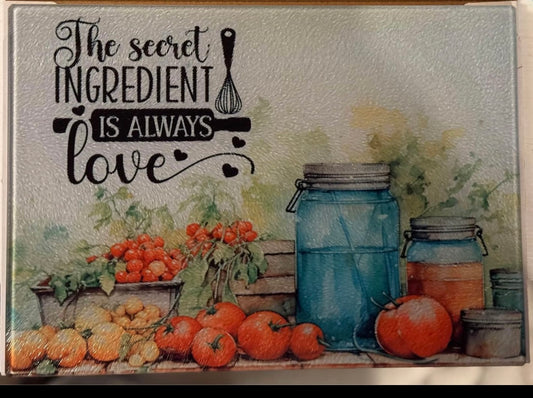 The secret ingredient is always love glass cutting board